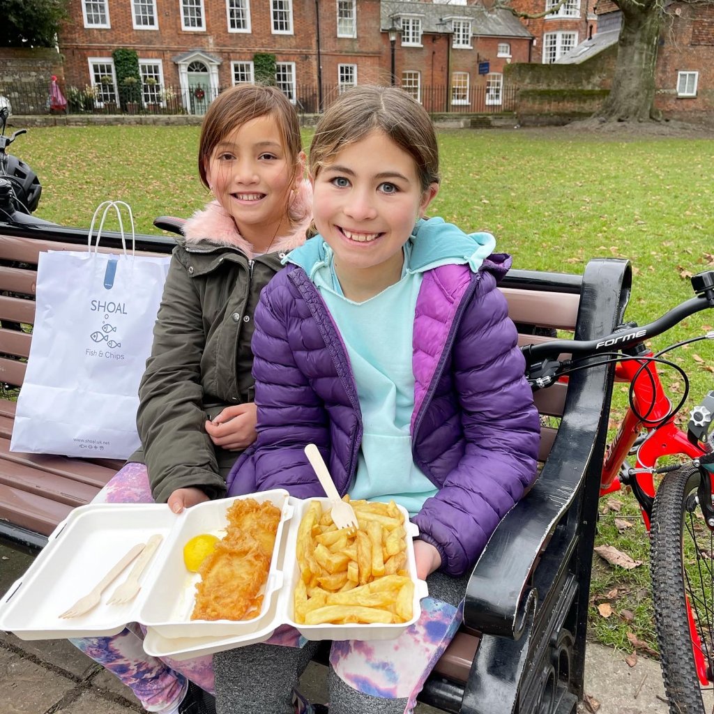 girls ready to eat their fish and chips