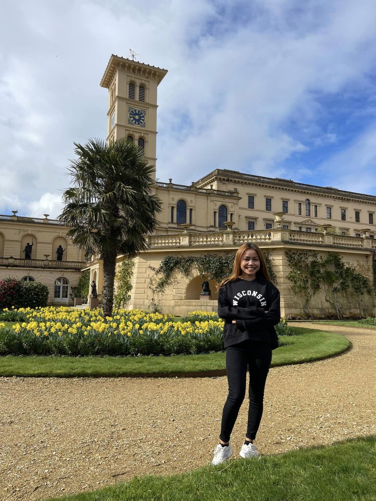 woman standing in front of osbourne house