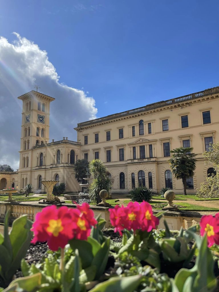 Osbourne house with pink flowers