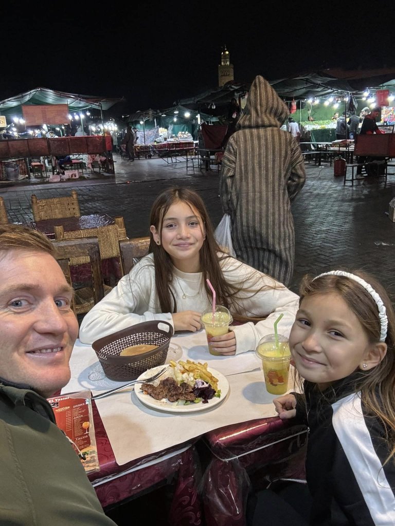 dad and daughters falafel dinner