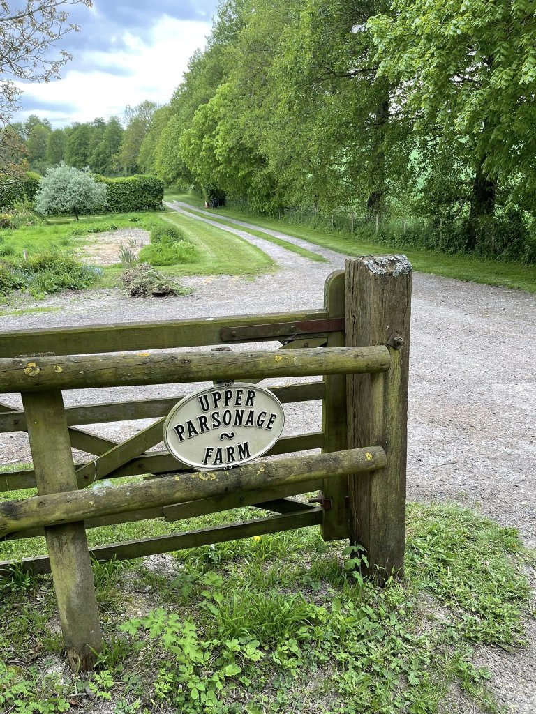 Upper parsonnage farm sign on wooden gate